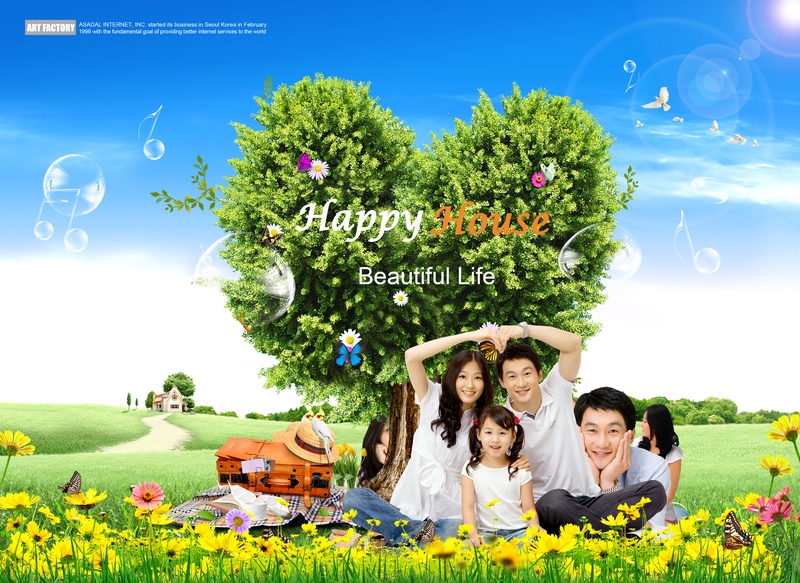 幸福家庭-草地上大树下做心形姿势的家人
