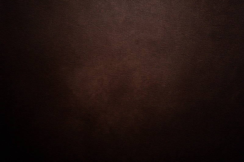 深棕色皮革背景图片